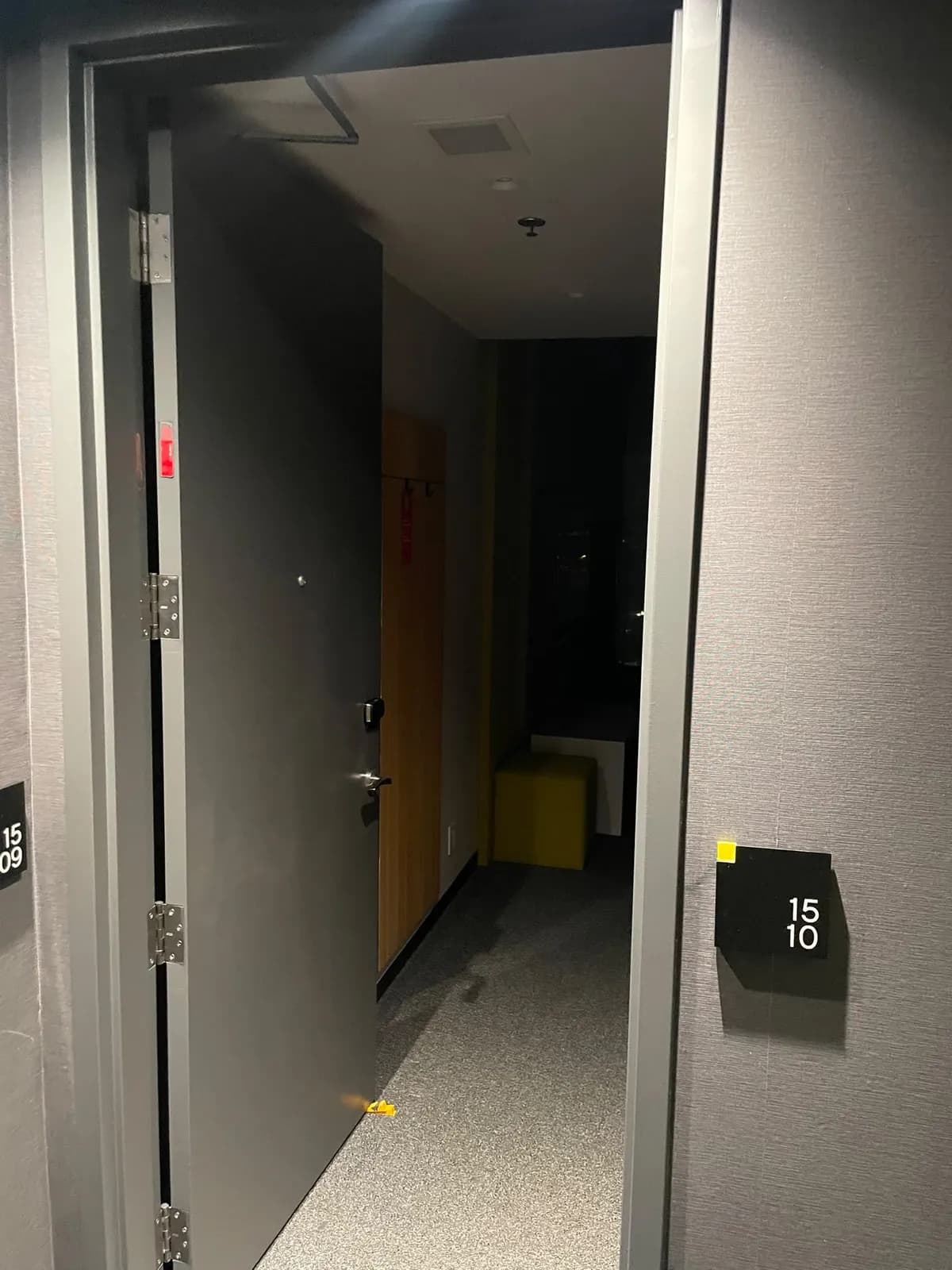 Guest corridor at Alt Hotel Saskatoon with two adjacent guest room doors open